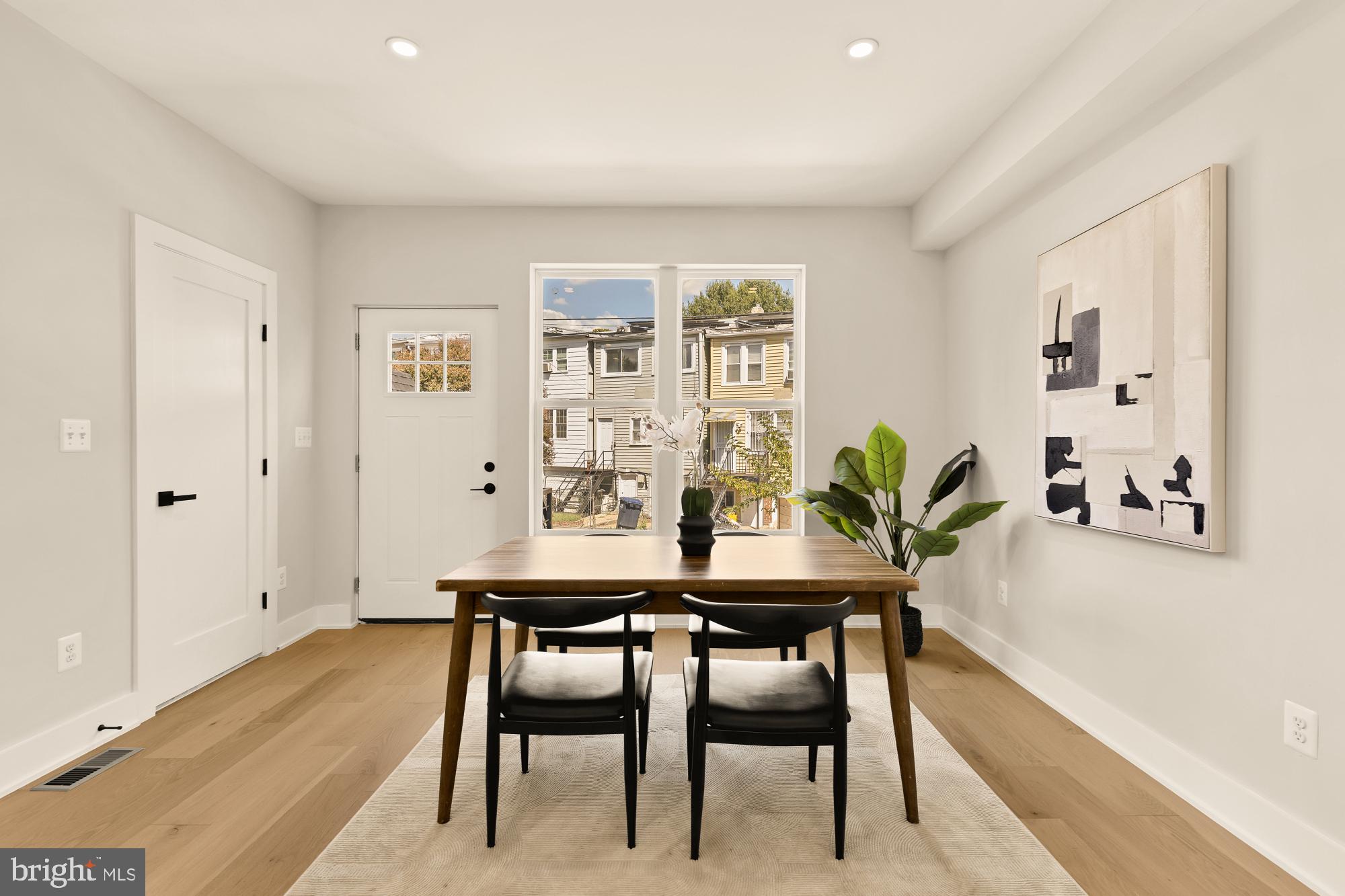815 Marietta Place Northwest Washington, DC 20011 - Photo 19 of 44 a view of a dining room with furniture and window