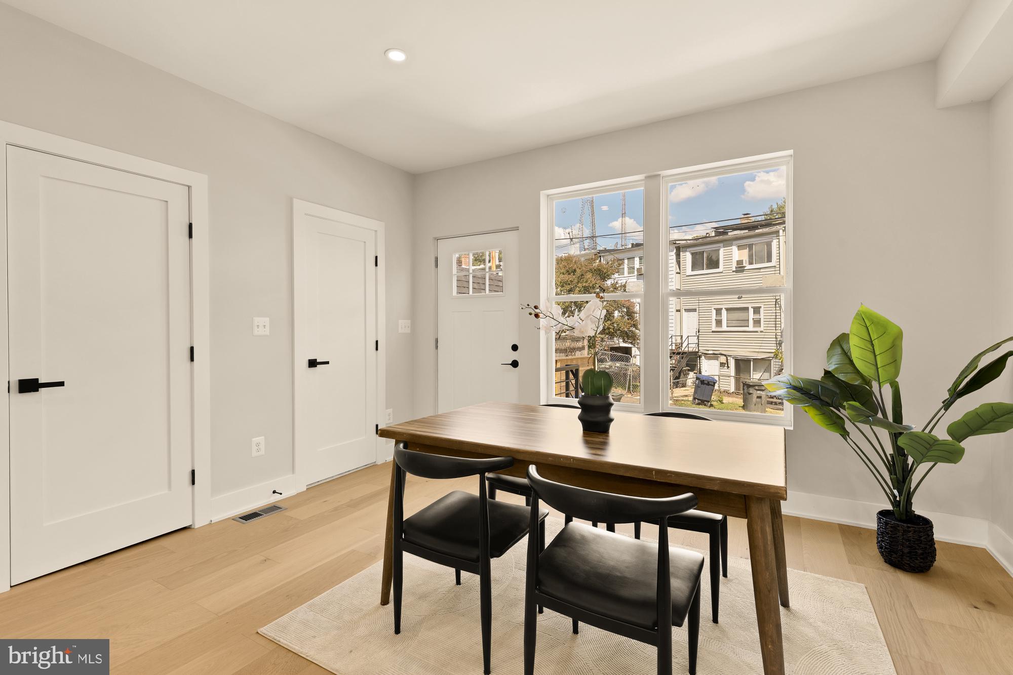 815 Marietta Place Northwest Washington, DC 20011 - Photo 20 of 44 a view of a dining room with furniture and wooden floor