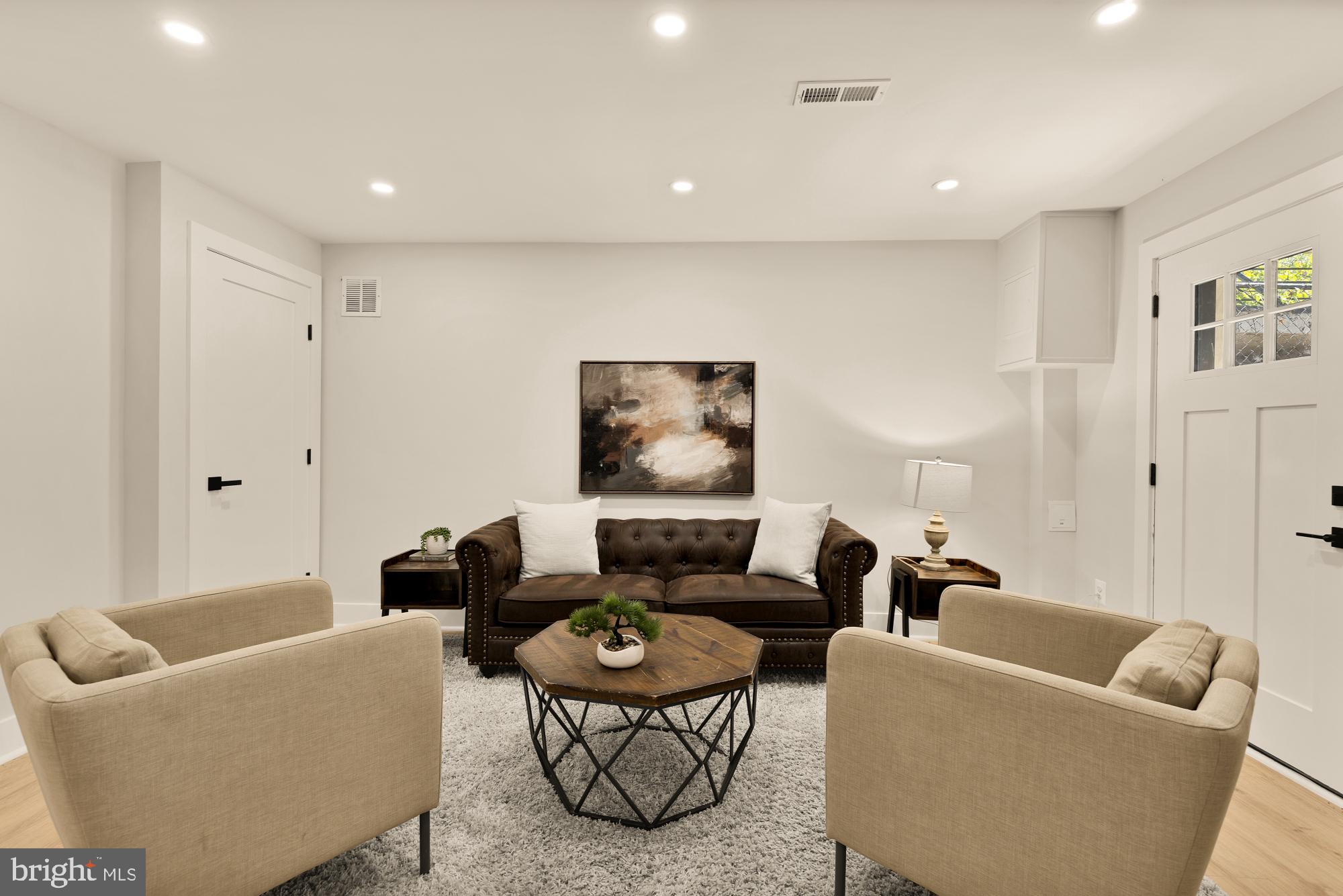 815 Marietta Place Northwest Washington, DC 20011 - Photo 36 of 44 a living room with furniture and a rug