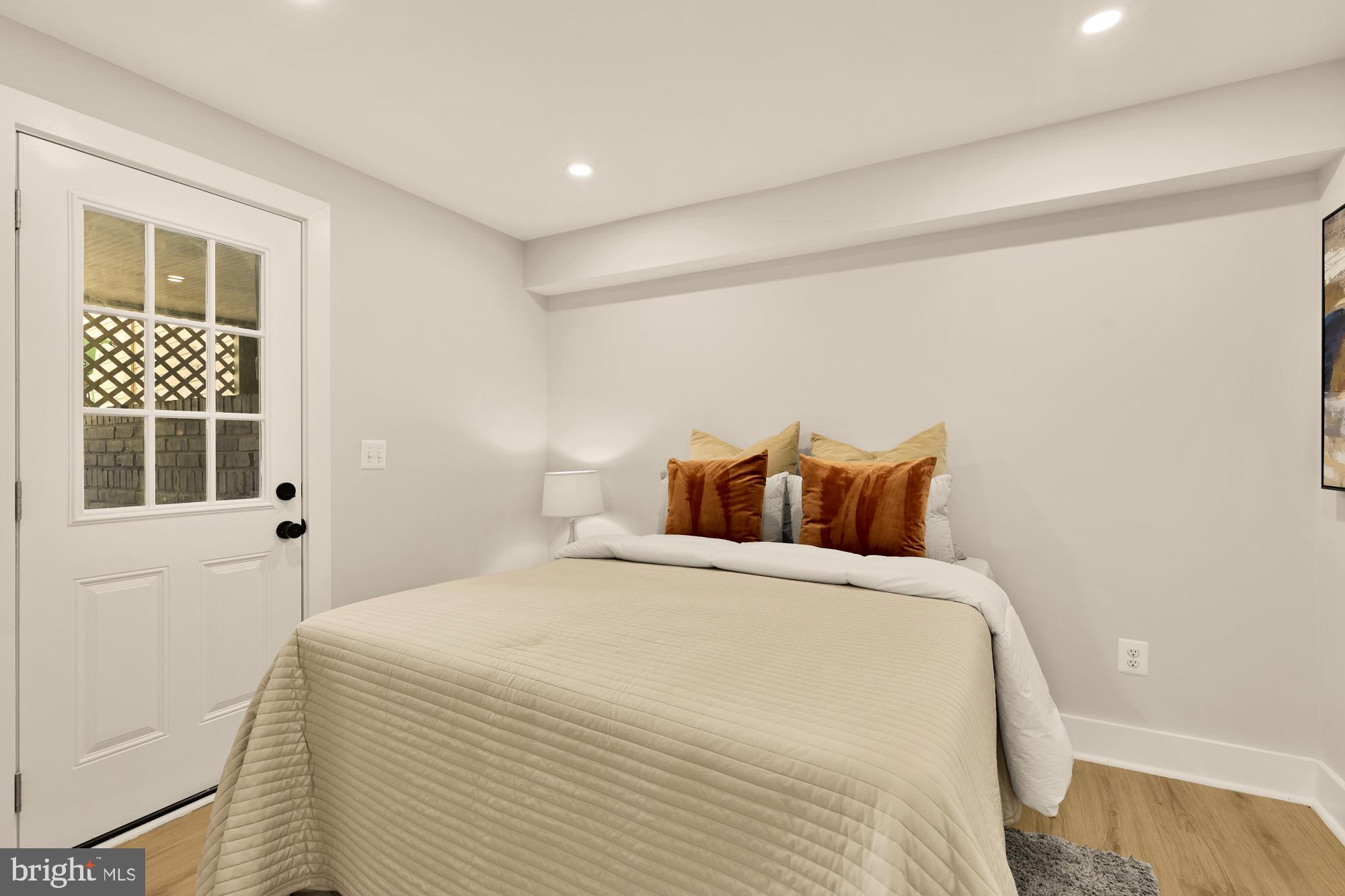 815 Marietta Place Northwest Washington, DC 20011 - Photo 39 of 44 a bedroom with a bed and a window