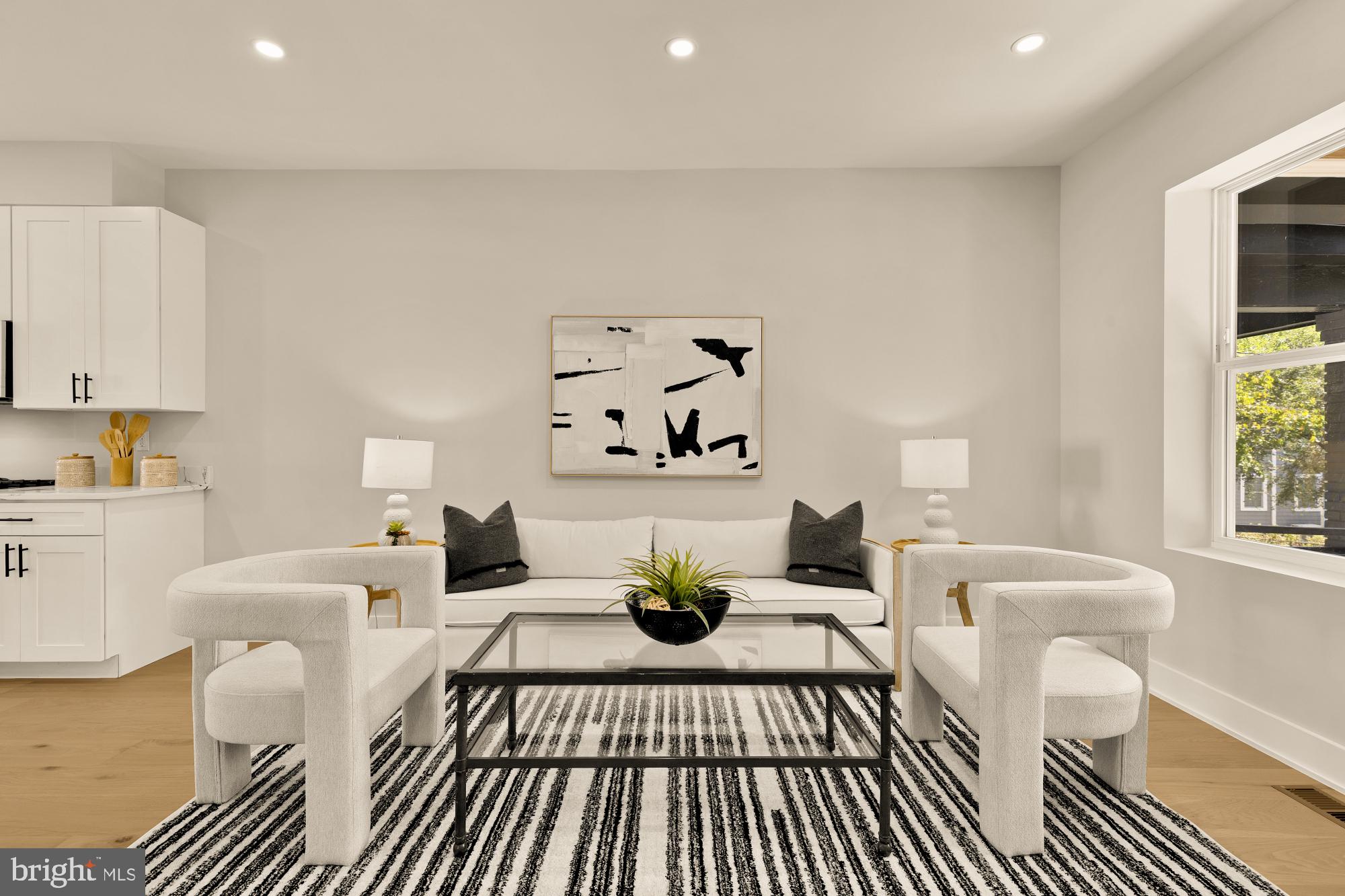 815 Marietta Place Northwest Washington, DC 20011 - Photo 4 of 44 a living room with furniture a rug and a table