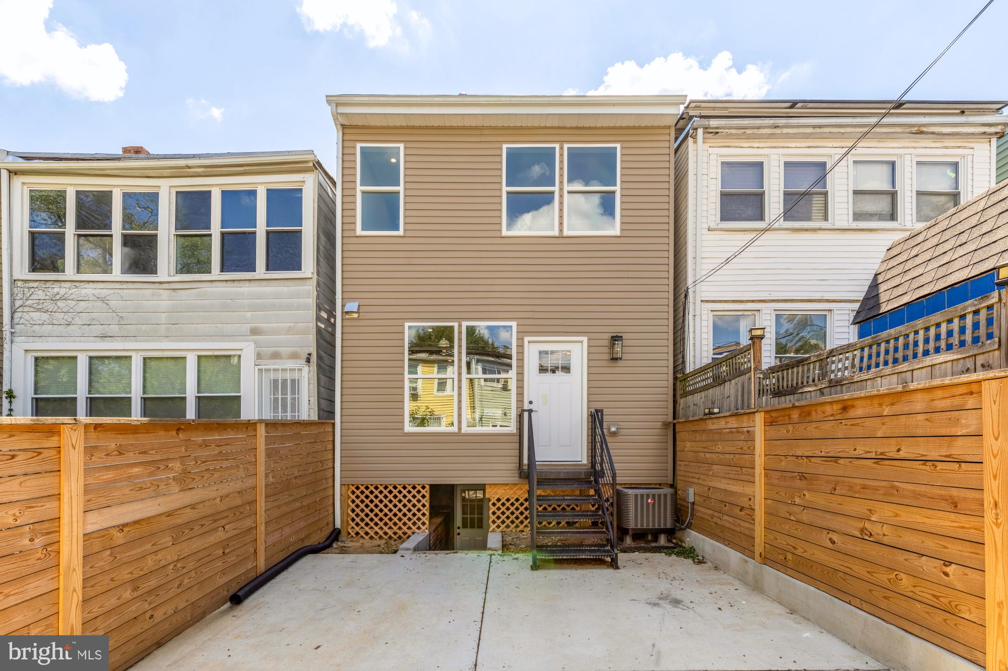 815 Marietta Place Northwest Washington, DC 20011 - Photo 42 of 44 a backyard of a house with sofas