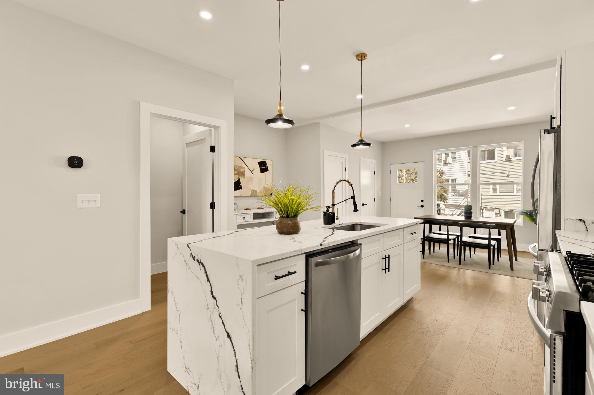 815 Marietta Place Northwest Washington, DC 20011 - Photo 9 of 44 a large kitchen with a lot of counter space and a sink