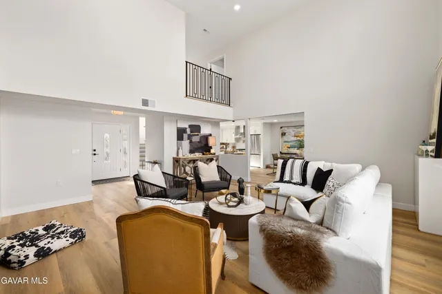 a view of a balcony with wooden floor