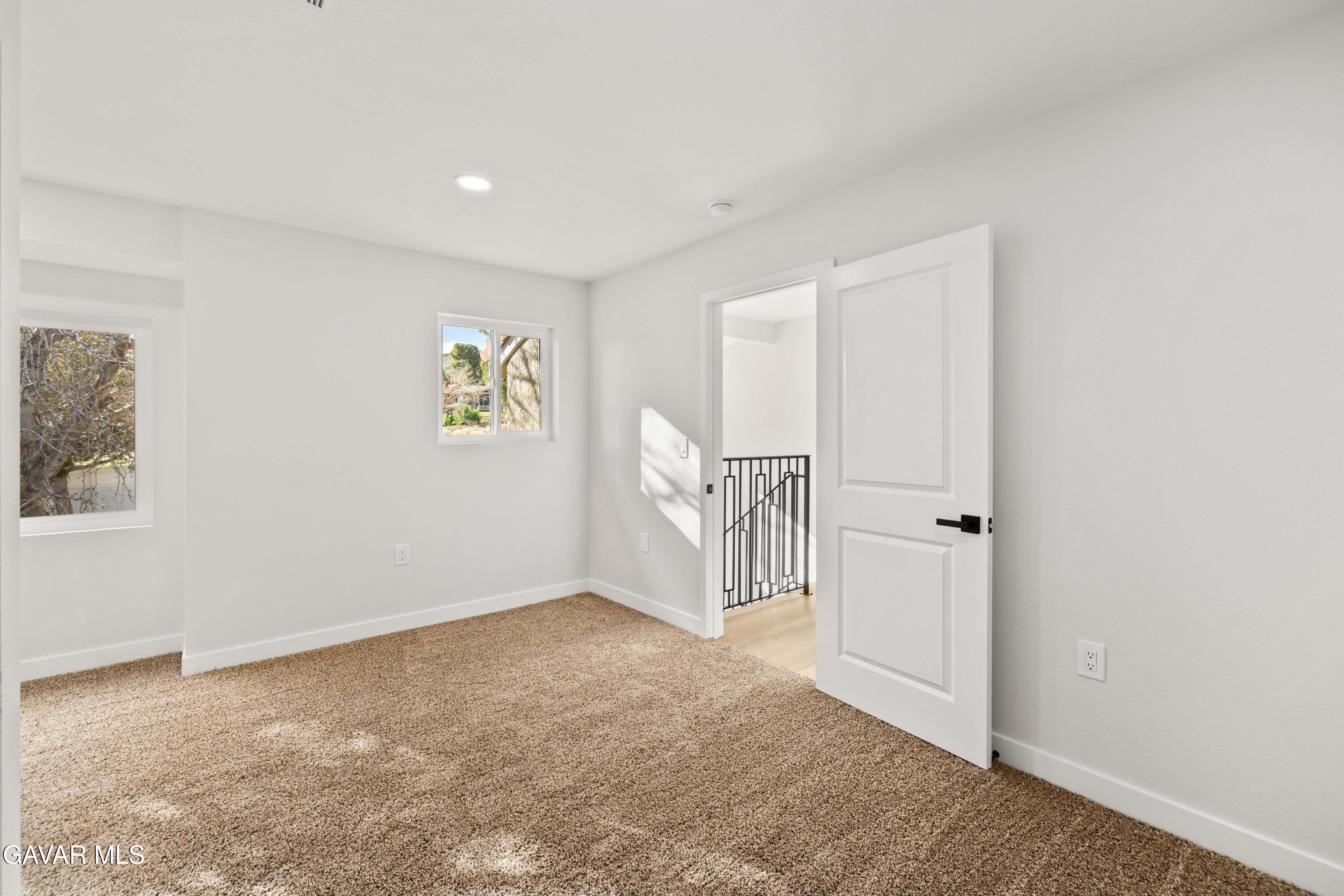 329 East Lago Lindo Road Palmdale, CA 93550 - Photo 29 of 39 a view of an empty room with a window