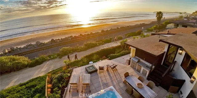 a view of a house with a yard and garage