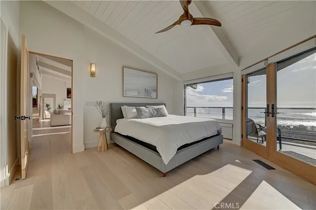 a living room with furniture and potted plant