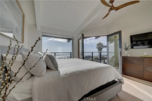 a bathroom with a double vanity sink mirror and toilet