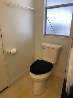 144 Holm Road, Unit 119 Watsonville, CA 95076 - Photo 19 of 29 a bathroom with a toilet and a sink