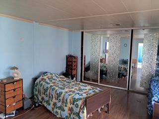 144 Holm Road, Unit 119 Watsonville, CA 95076 - Photo 22 of 29 a bedroom with a bed and a dresser