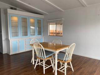 144 Holm Road, Unit 119 Watsonville, CA 95076 - Photo 9 of 29 a view of a dining room with furniture window and wooden floor