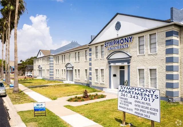a front view of a house with swimming pool
