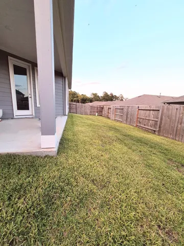 a view of a backyard with a garden