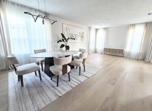 a view of a livingroom with furniture and window