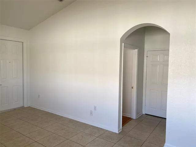 an empty room with window