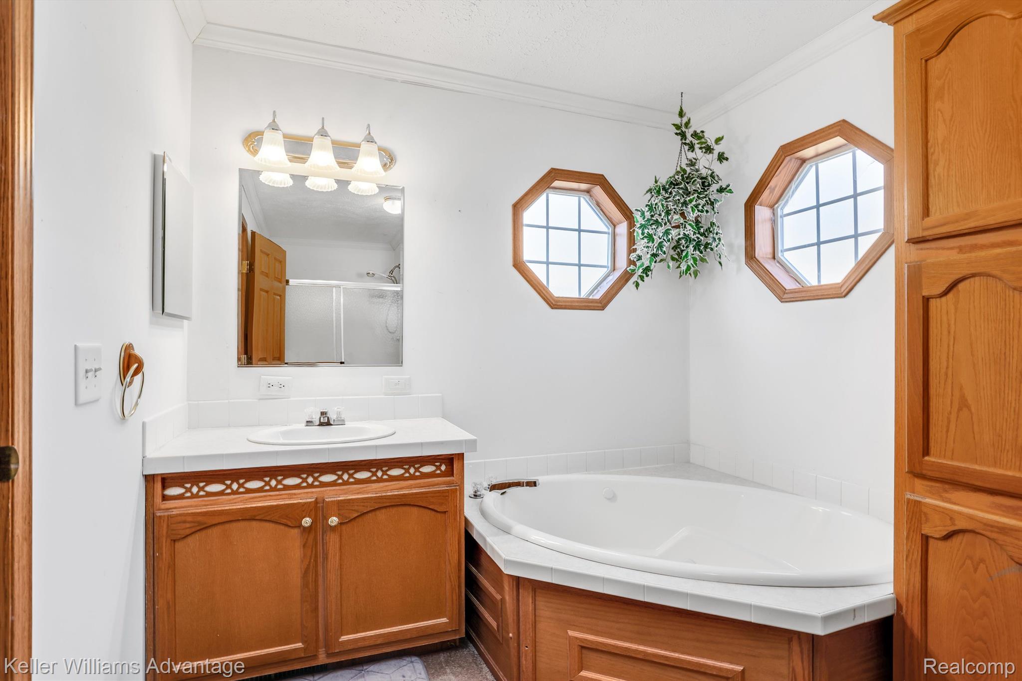 12242 Bunton Road Willis, MI 48191 - Photo 7 of 27 Primary Bath features soaking tub