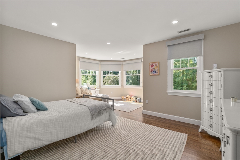 9 MacIntyre Drive North Reading, MA 01864 - Photo 23 of 41 a bedroom with a large bed and a window