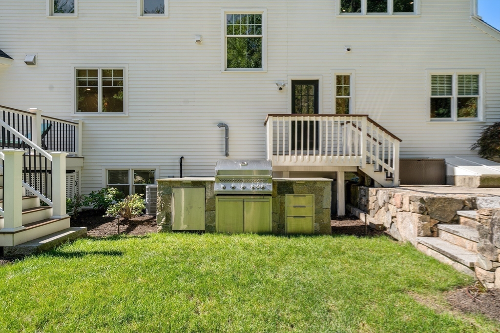 9 MacIntyre Drive North Reading, MA 01864 - Photo 32 of 41 a view of a house with a yard
