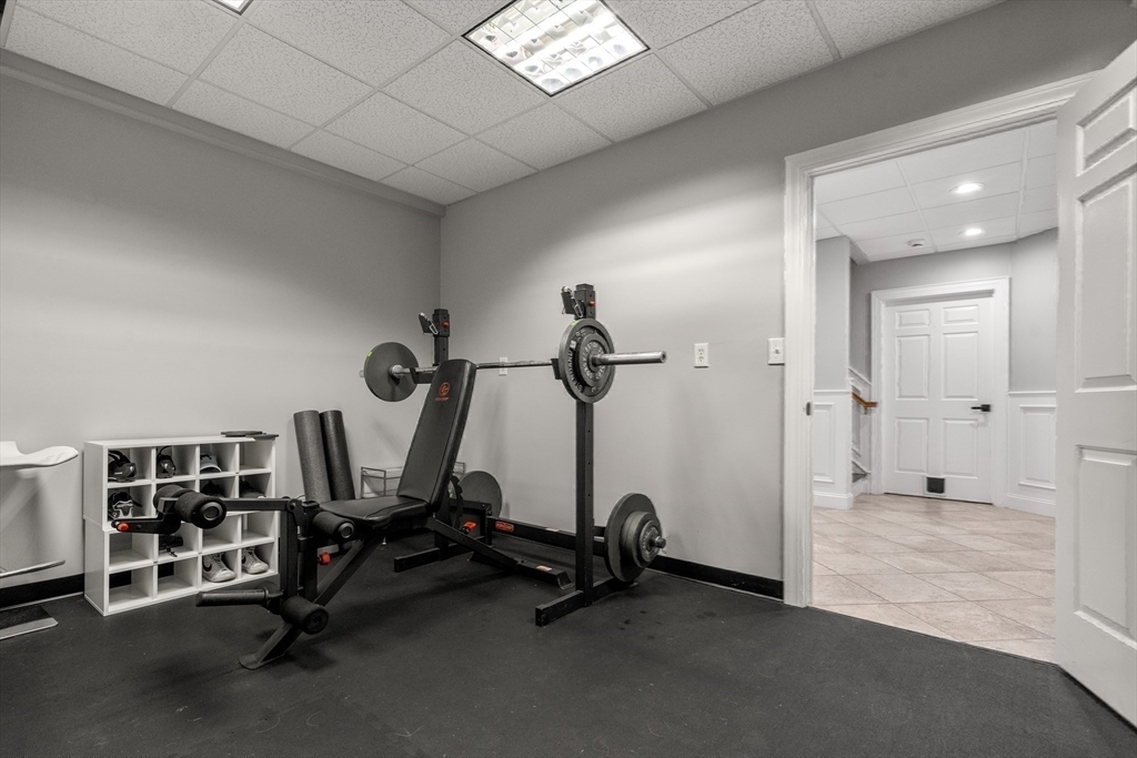 9 MacIntyre Drive North Reading, MA 01864 - Photo 34 of 41 a view of a room with gym equipment