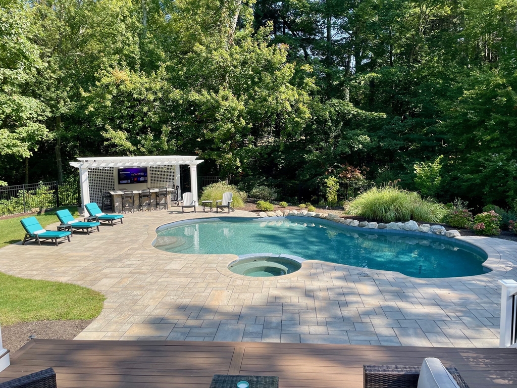 9 MacIntyre Drive North Reading, MA 01864 - Photo 38 of 41 a view of a house with swimming pool