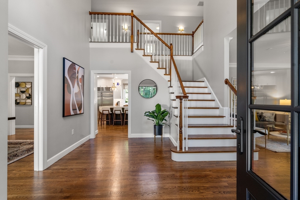 9 MacIntyre Drive North Reading, MA 01864 - Photo 4 of 41 a view of entryway and hall with wooden floor