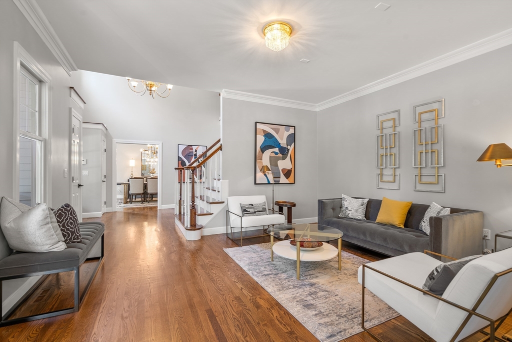 9 MacIntyre Drive North Reading, MA 01864 - Photo 6 of 41 a living room with furniture and wooden floor