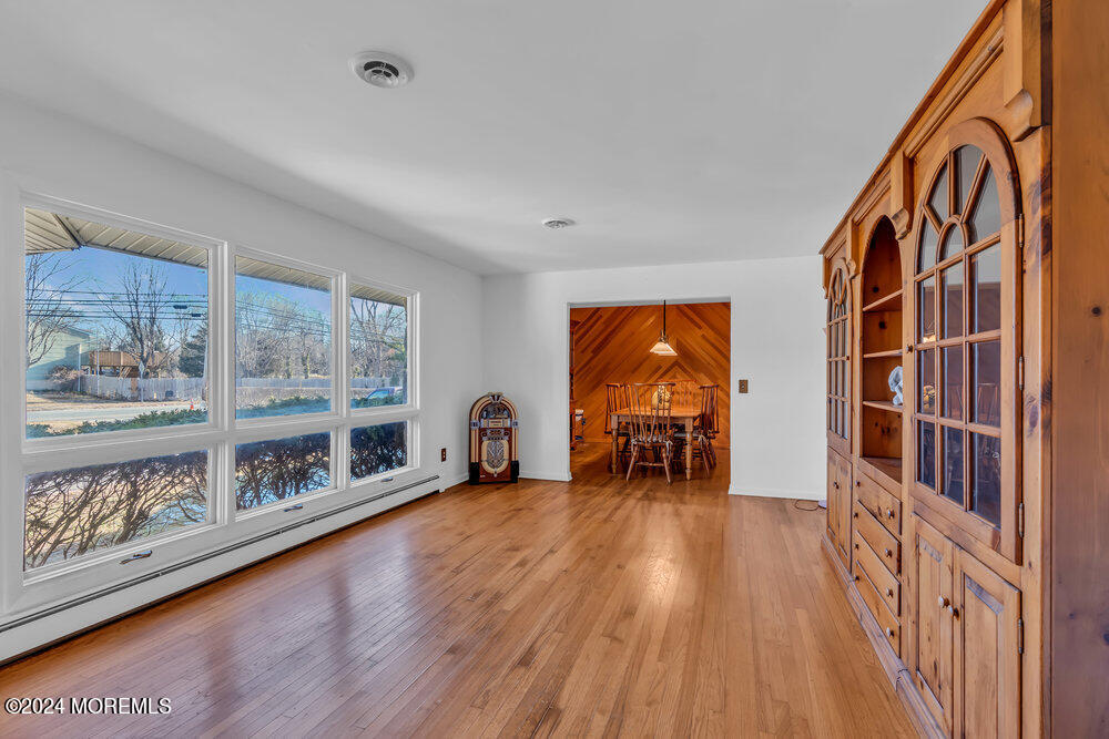 1400 Lanes Mill Road Lakewood, NJ 08701 - Photo 13 of 40 a living room with furniture and a large window