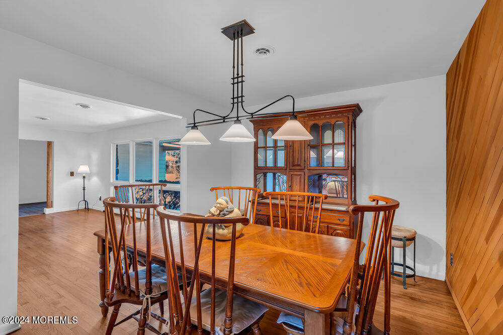 1400 Lanes Mill Road Lakewood, NJ 08701 - Photo 14 of 40 a view of a dining room with furniture and window