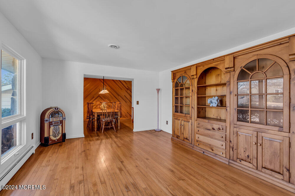 1400 Lanes Mill Road Lakewood, NJ 08701 - Photo 3 of 40 wooden floor in an empty room with a window