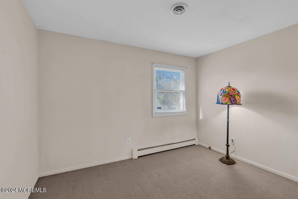 1400 Lanes Mill Road Lakewood, NJ 08701 - Photo 34 of 40 a view of a room with gym equipment