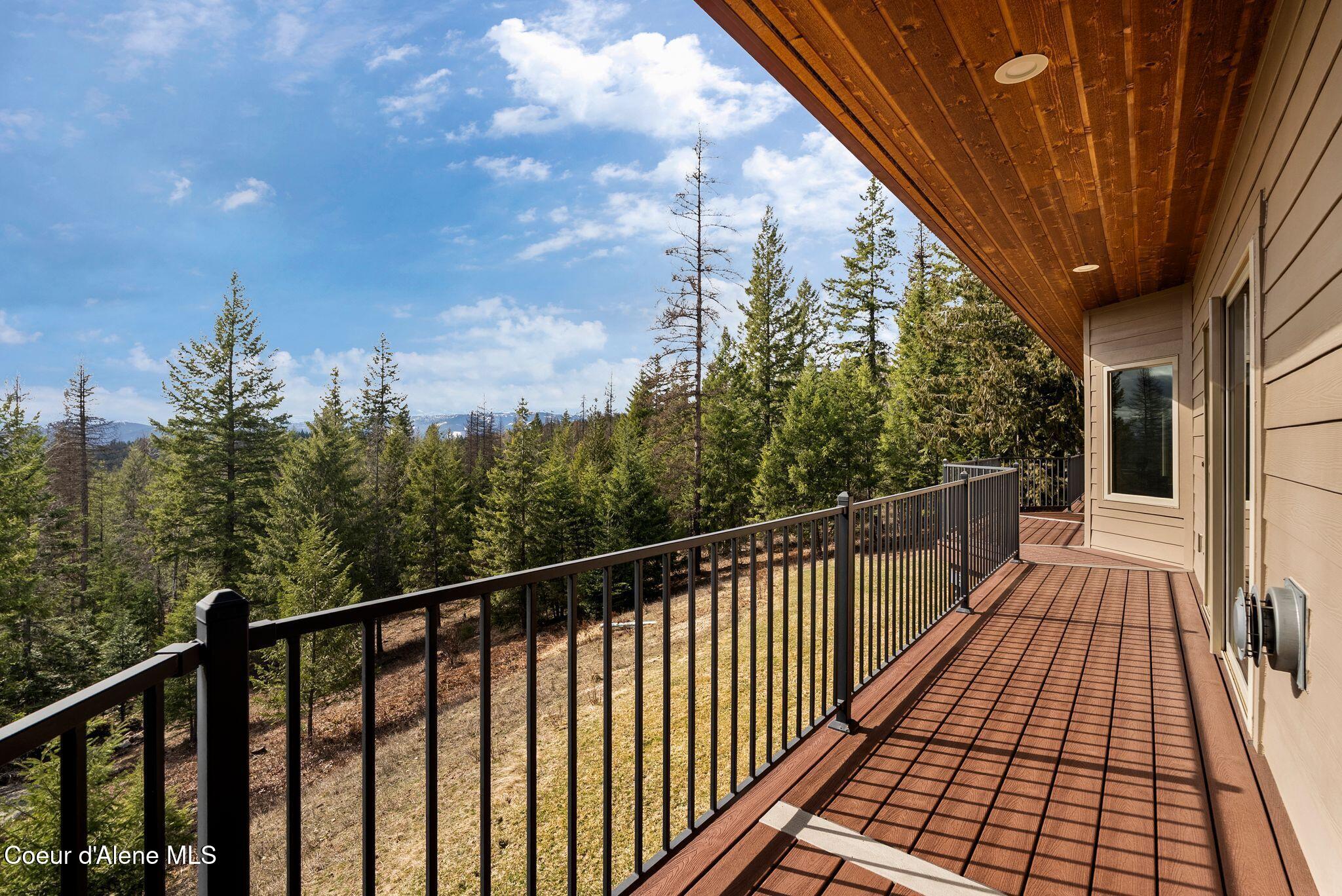 422 Lightning Peak Road Sandpoint, ID 83864 - Photo 30 of 92 Wrap-around covered decks