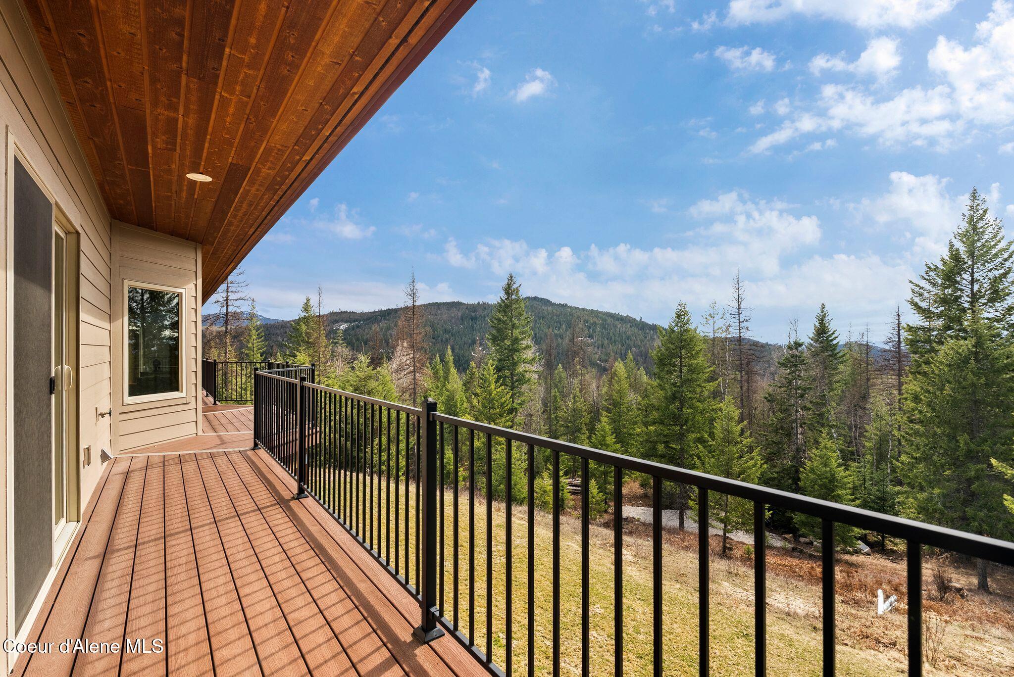 422 Lightning Peak Road Sandpoint, ID 83864 - Photo 32 of 92 Expansive covered deck
