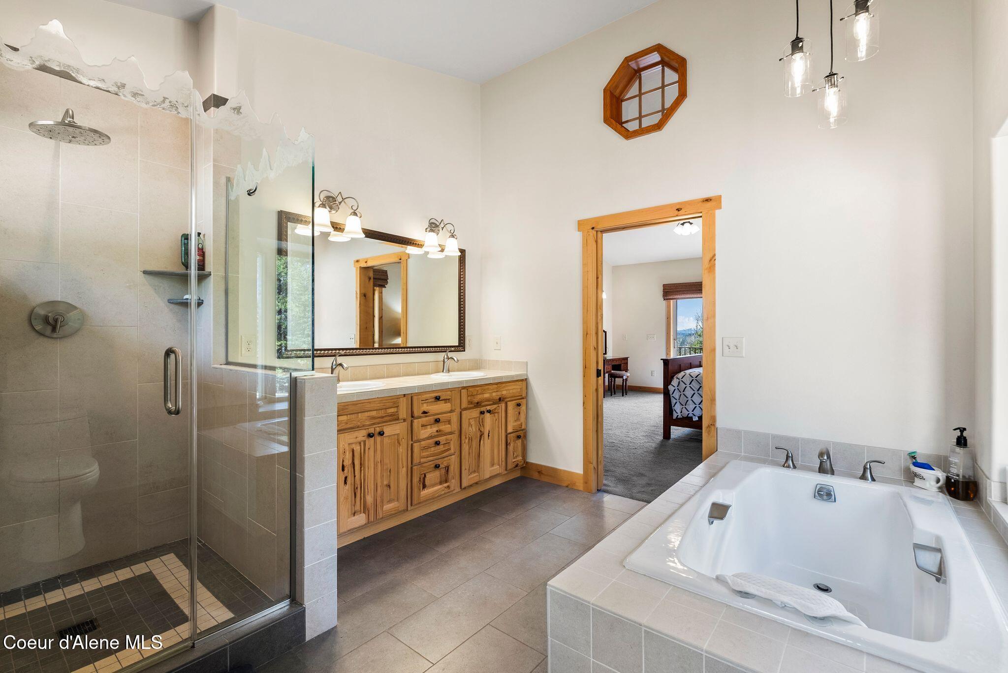 422 Lightning Peak Road Sandpoint, ID 83864 - Photo 40 of 92 Master private bathroom