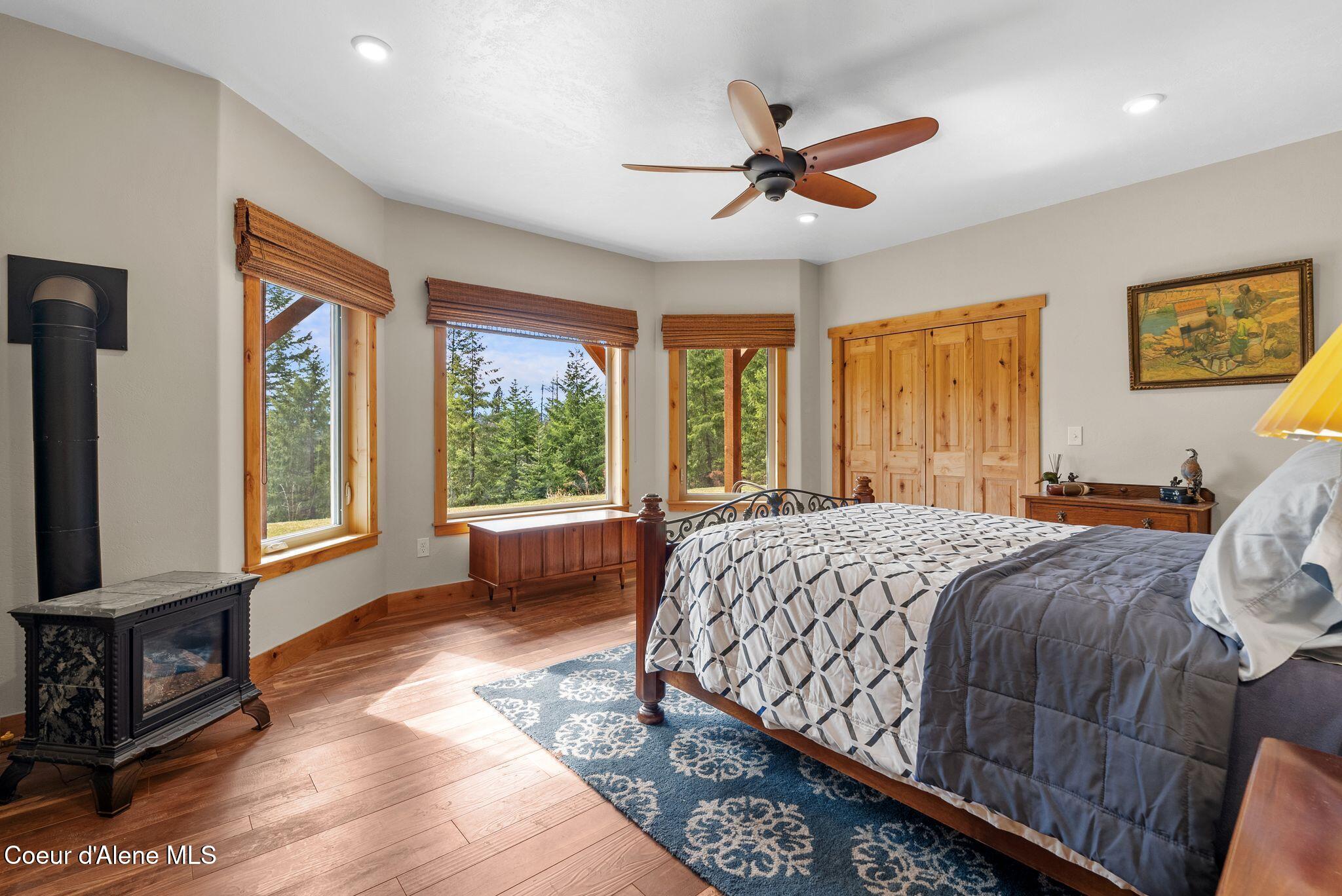 422 Lightning Peak Road Sandpoint, ID 83864 - Photo 47 of 92 Guest bedroom 1 with patio access