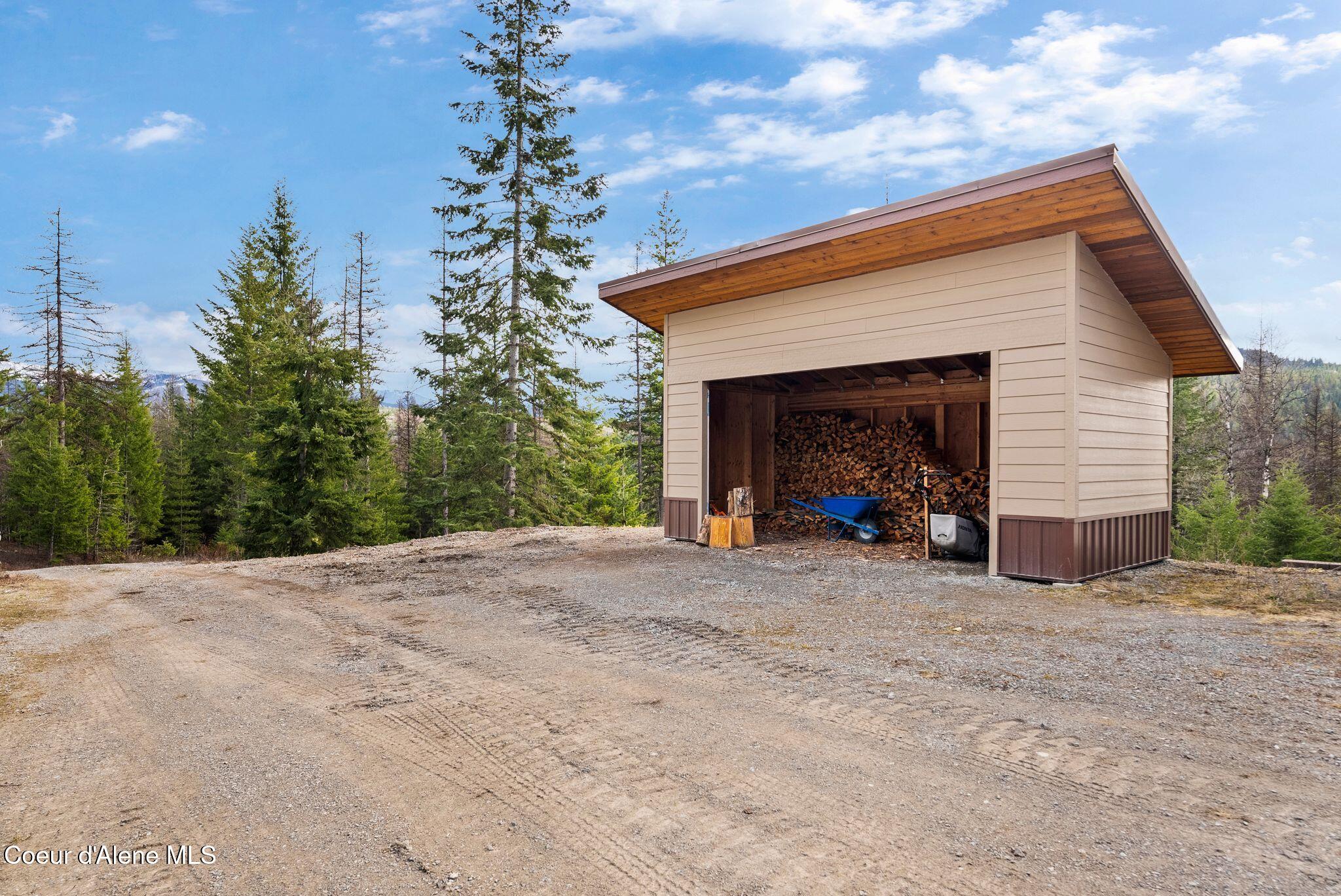 422 Lightning Peak Road Sandpoint, ID 83864 - Photo 72 of 92 Wood storage building