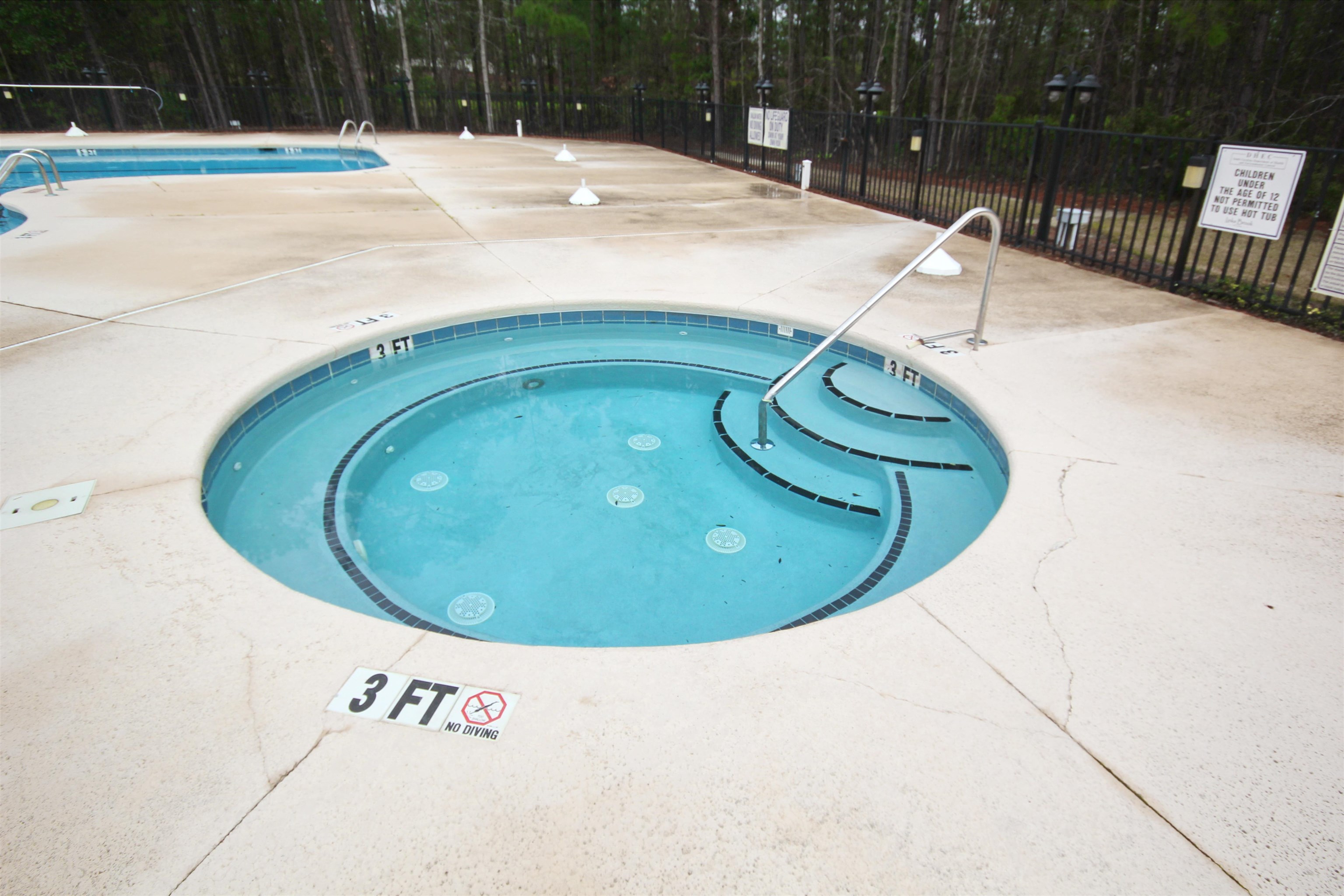 4 Guillemont Court Murrells Inlet, SC 29576 - Photo 35 of 40 Community pool with a hot tub and a patio
