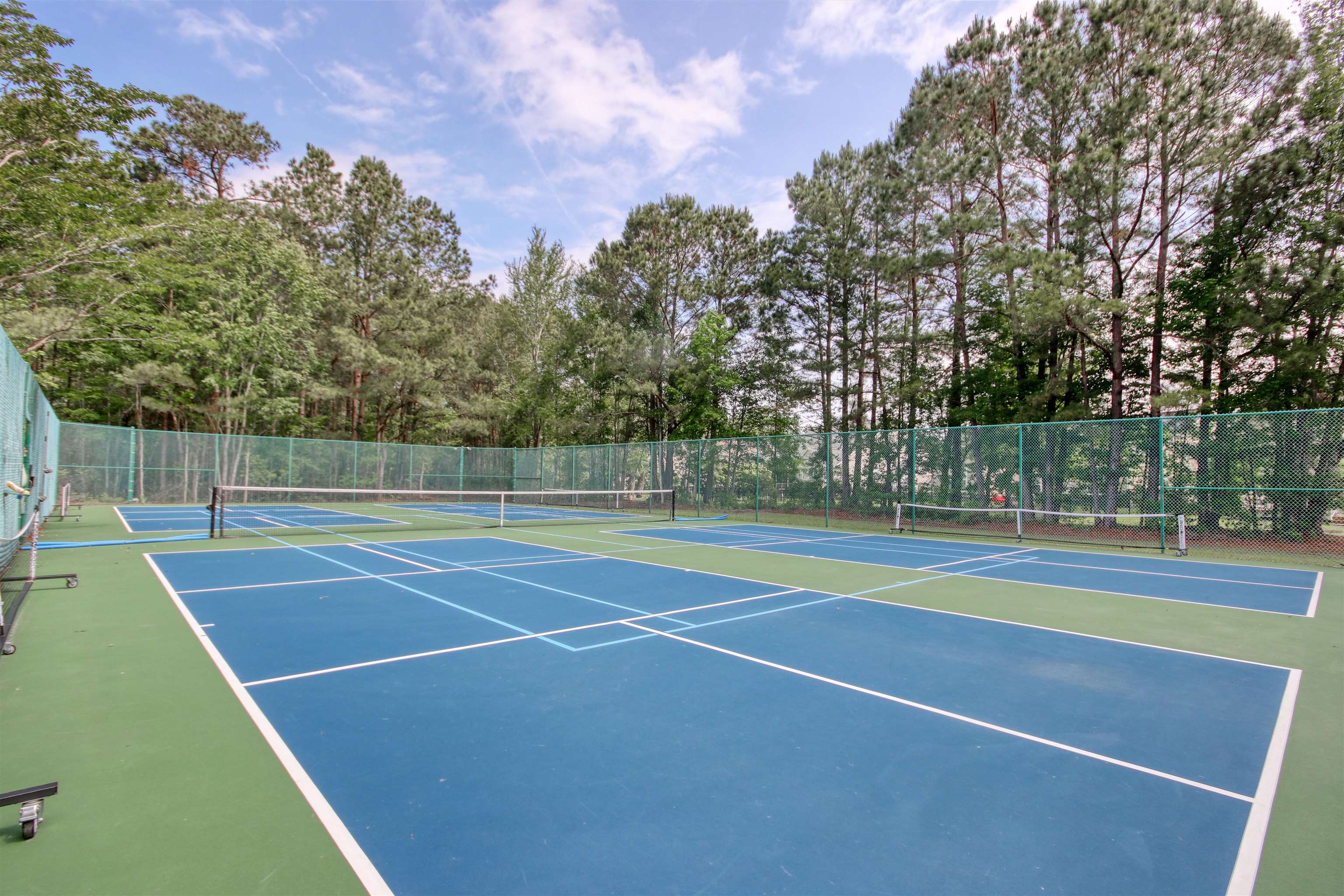 4 Guillemont Court Murrells Inlet, SC 29576 - Photo 36 of 40 View of tennis court featuring community basketball court