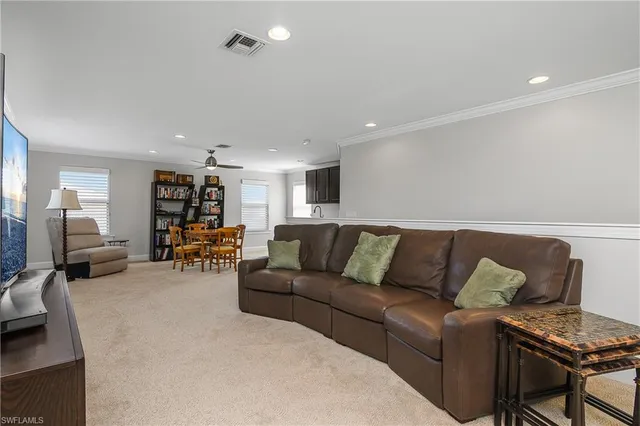 a living room with furniture and a couch