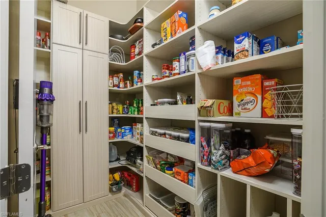 a store room with lots of different colored cloths