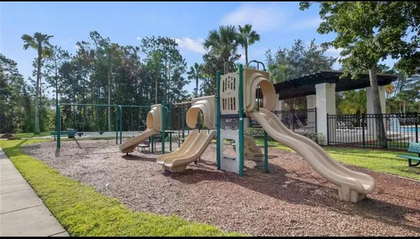 a view of a park with slide