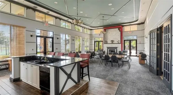 a view of a dining room with furniture window and outside view