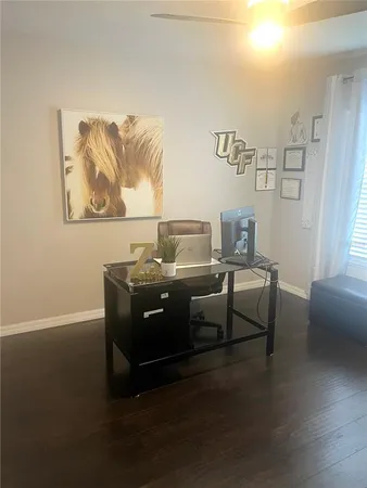a living room with couch and a table