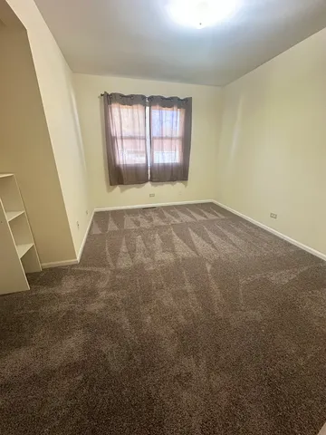 an empty room with a natural light