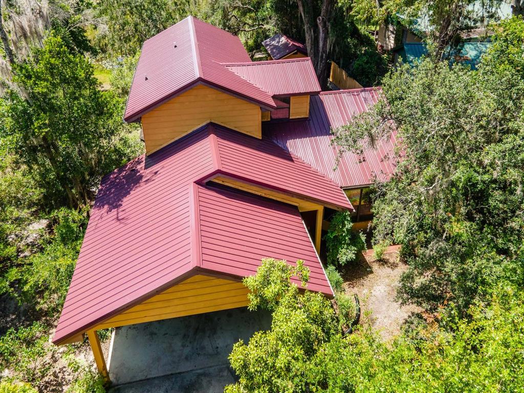 23610 Northeast 154th Place Road Fort McCoy, FL 32134 - Photo 3 of 44 a aerial view of a house with a yard
