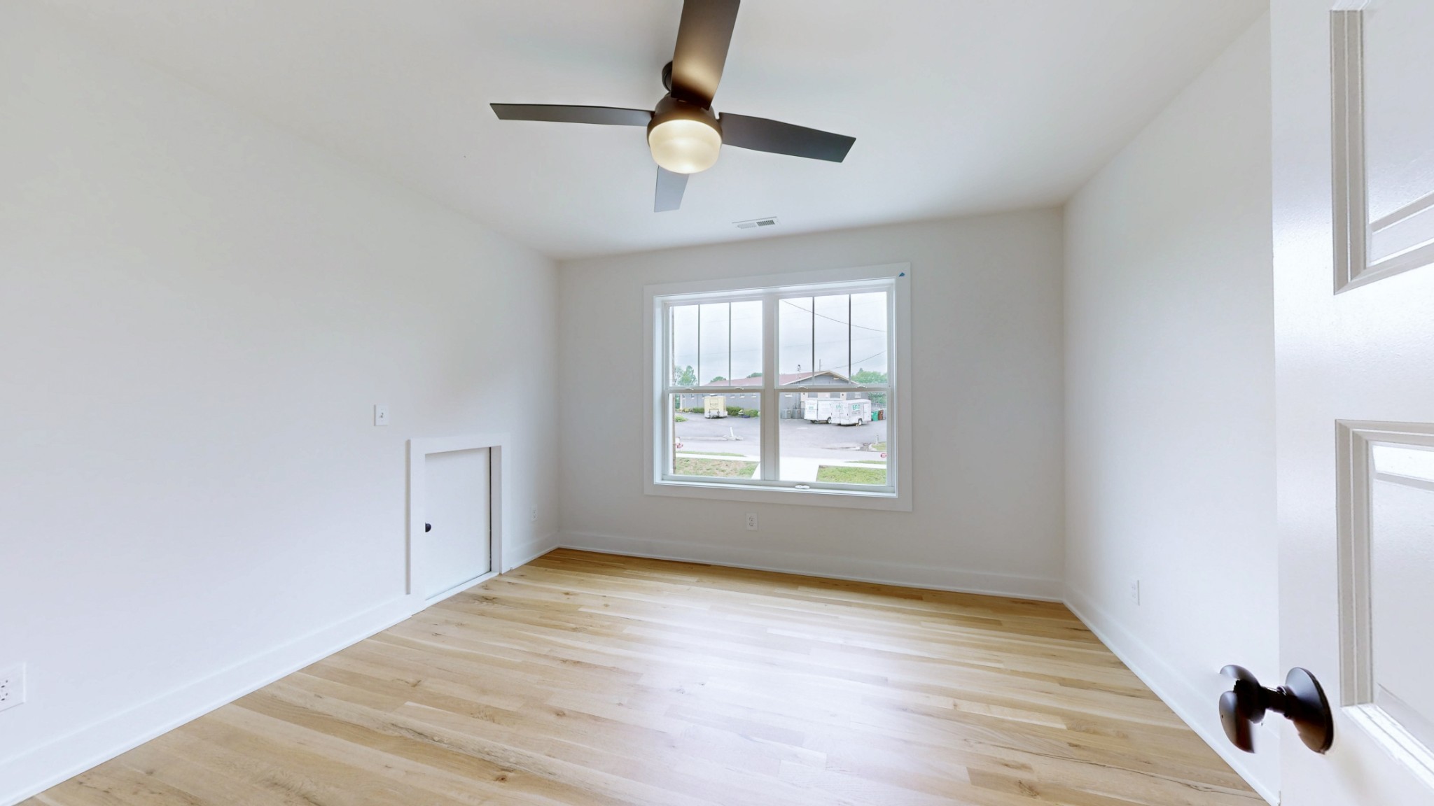 1805 Golf Club Road Old Hickory, TN 37138 - Photo 19 of 26 wooden floor in an empty room with a window