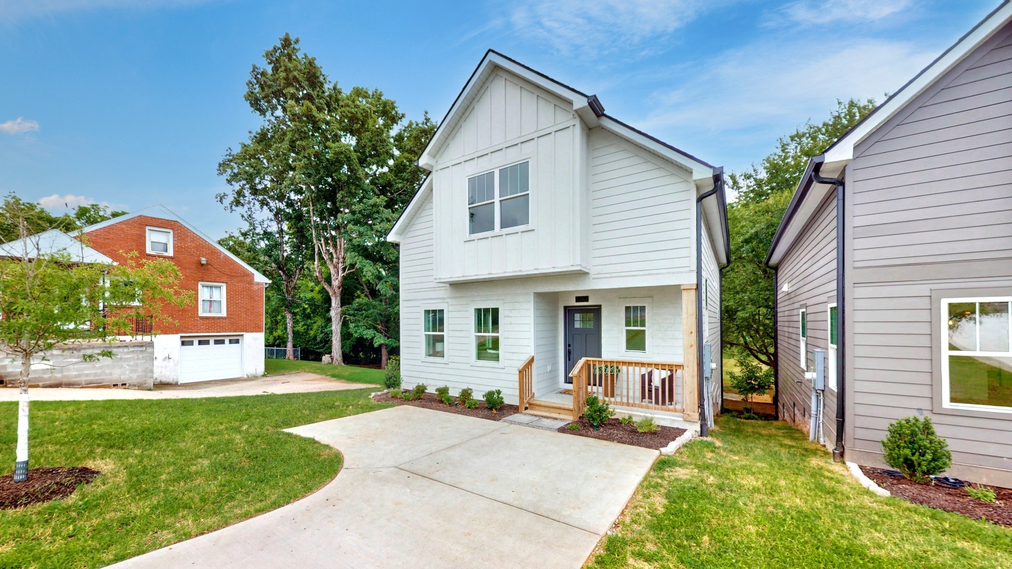 1805 Golf Club Road Old Hickory, TN 37138 - Photo 24 of 26 a front view of a house with a yard and porch
