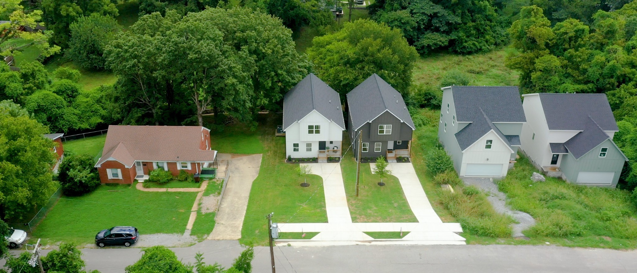 1805 Golf Club Road Old Hickory, TN 37138 - Photo 26 of 26 an aerial view of a house with a garden and trees