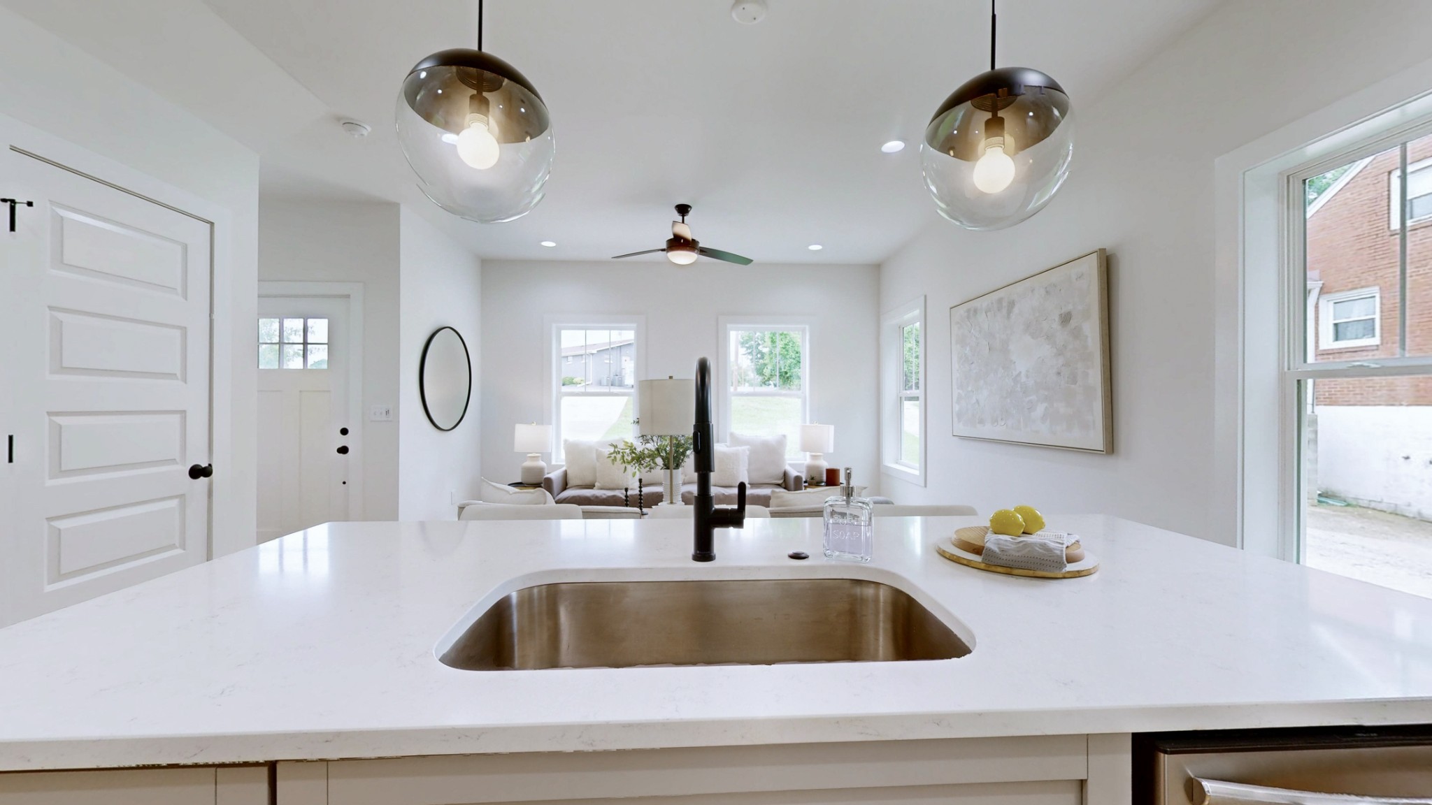 1805 Golf Club Road Old Hickory, TN 37138 - Photo 6 of 26 a kitchen with a sink a chandelier and living room view