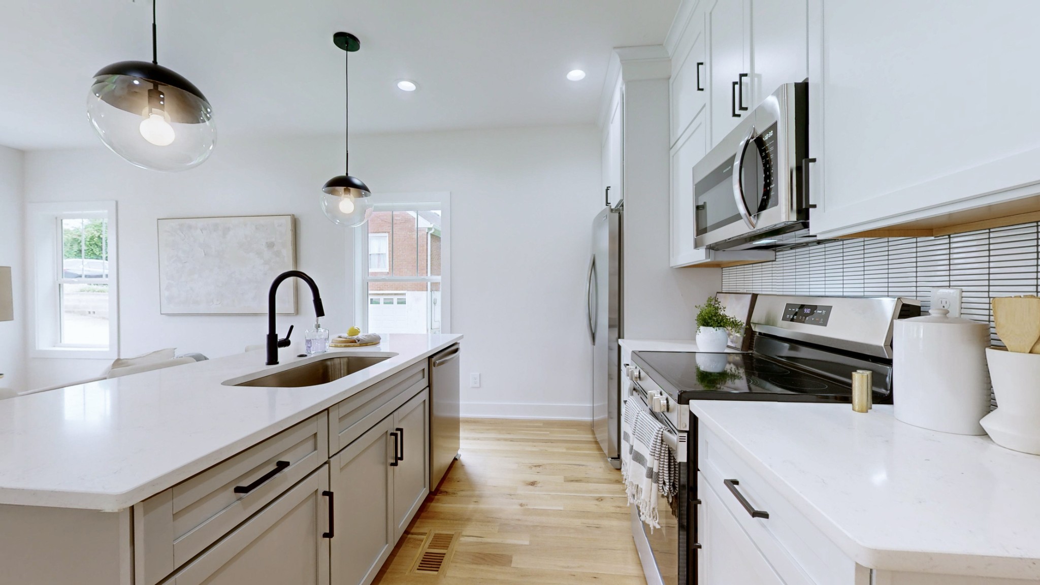 1805 Golf Club Road Old Hickory, TN 37138 - Photo 7 of 26 a kitchen with stainless steel appliances granite countertop a sink a stove and a refrigerator