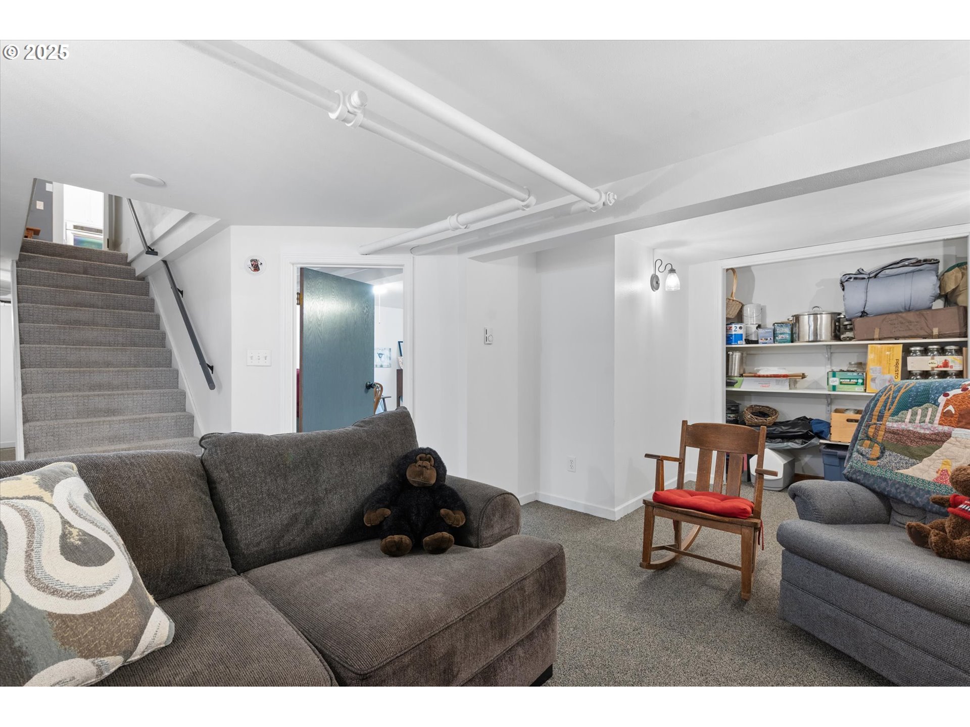 1402 2nd Street La Grande, OR 97850 - Photo 34 of 47 a living room with furniture and a wooden floor